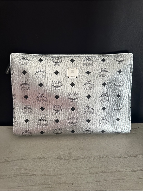 MCM Handbags - MCM Metallic Silver Logo Clutch